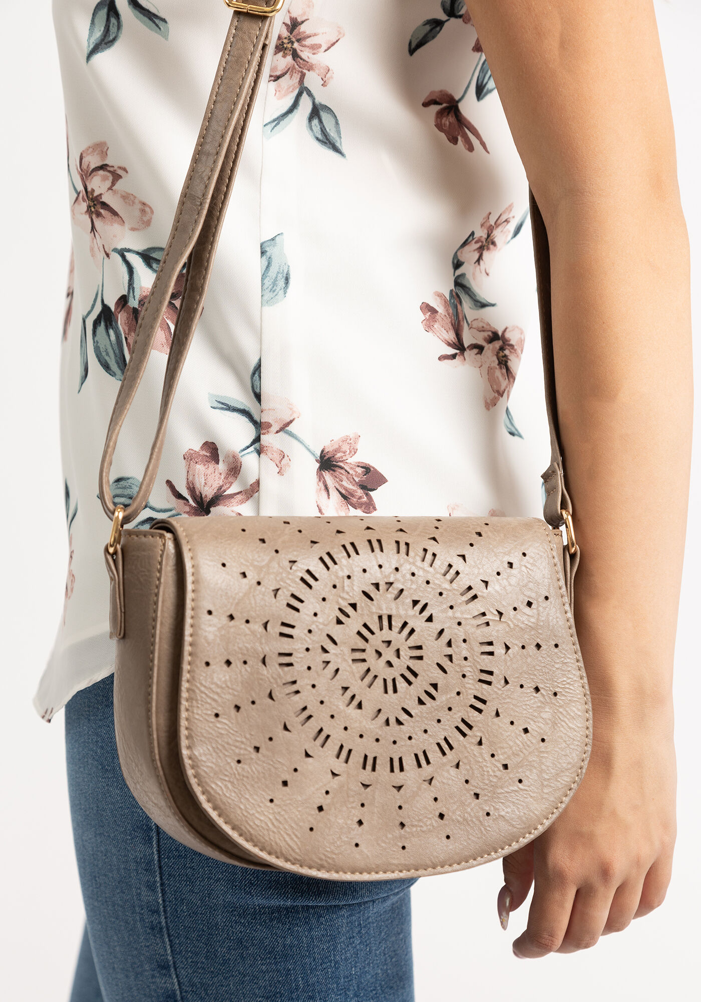 laser cutout flap front crossbody bag Image 1