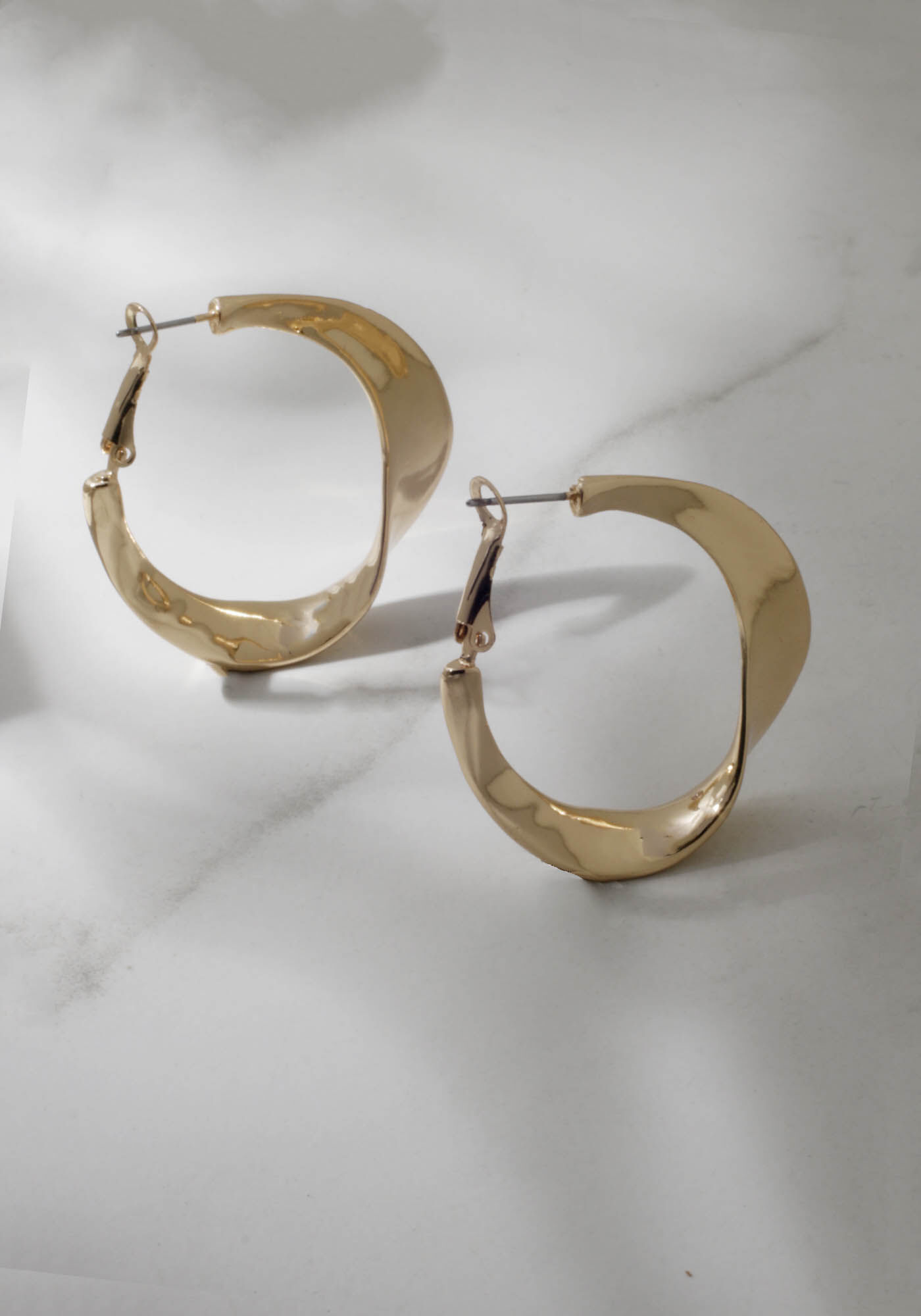 large gold hoop earrings Image 1