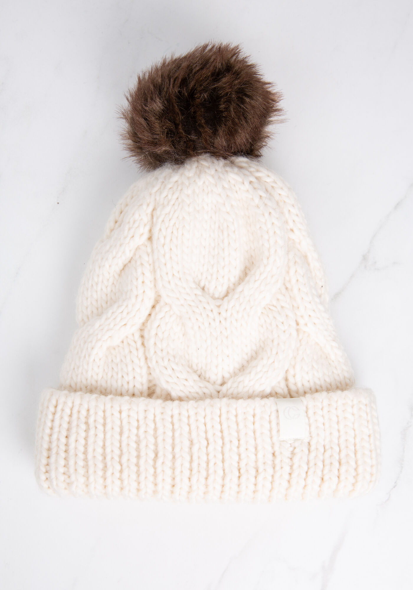 cable knit toque w faux fur pom Image 1