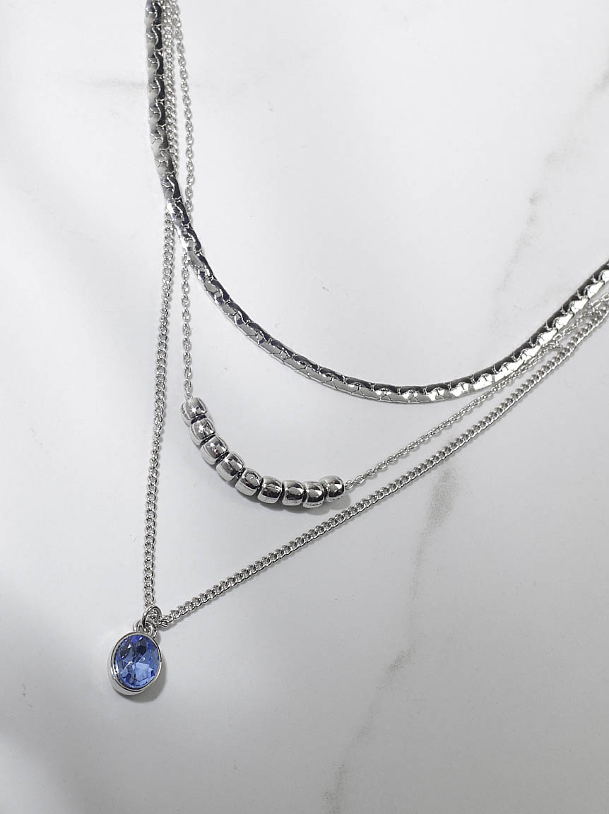 3 layer necklace with blue gem